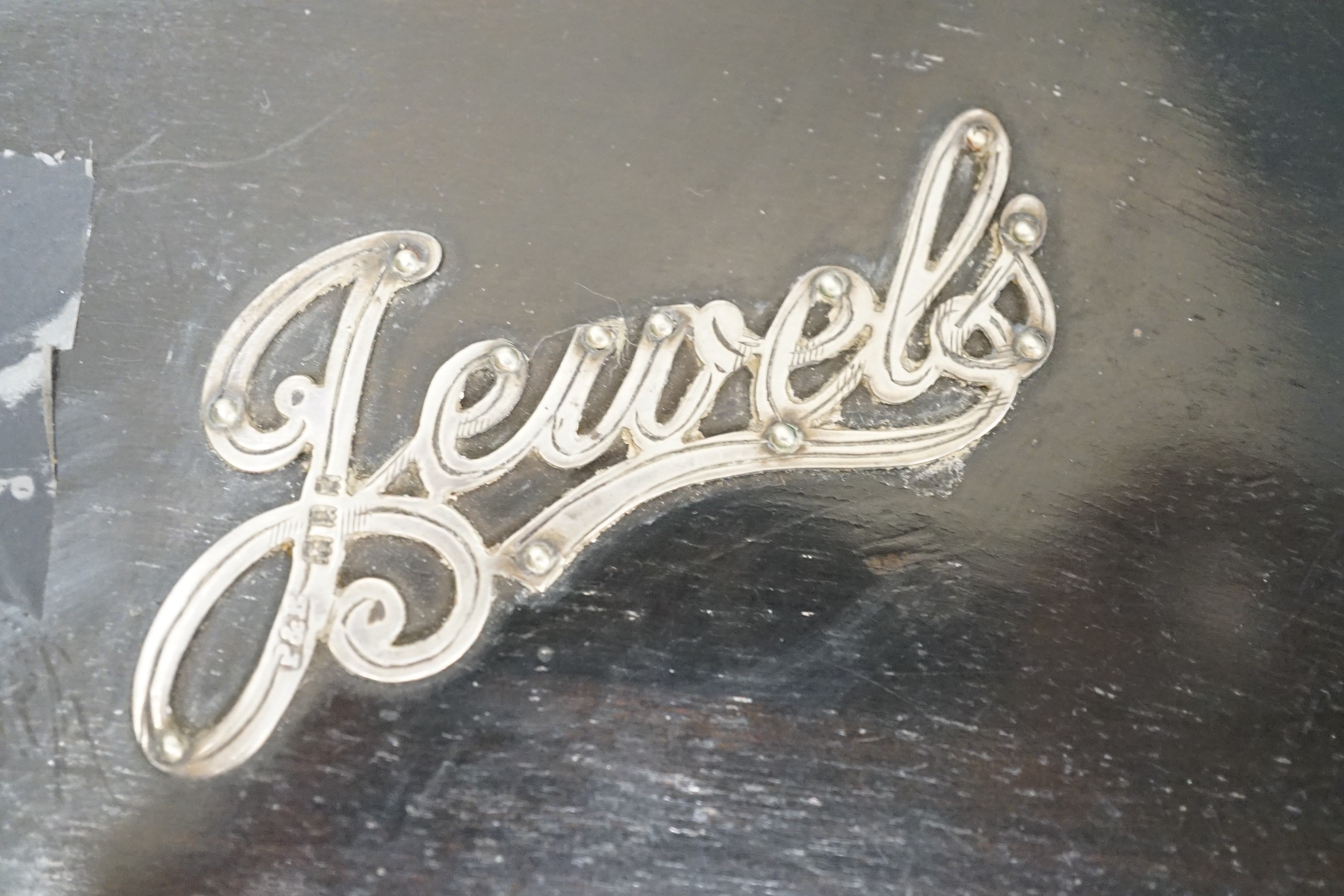 A Victorian silver mounted ebonised 'jewels' box and three jars